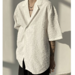 Asymmetric Button Embossed Pattern Loose Short Sleeve Shirt