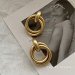 Baroque Golden Clip-On Hoop Earrings - Image 4