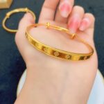 Gold Clover Motif Minimalist Bangle Bracelet - Image 4