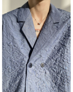 Asymmetric Button Embossed Pattern Loose Short Sleeve Shirt - Image 10