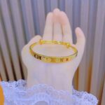 Gold Clover Motif Minimalist Bangle Bracelet - Image 5